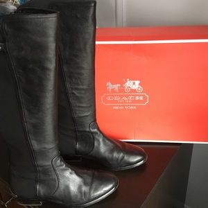 Leather riding boots by Coach.